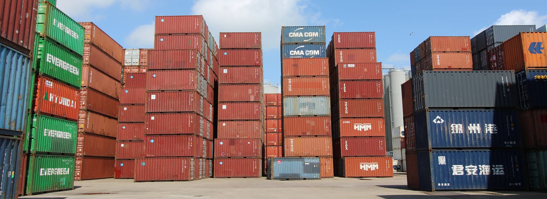 Stacked shipping containers in a yard